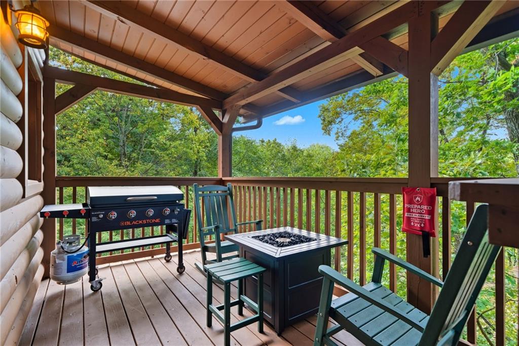 469 Moss Patch Trail Jasper, GA 30143 - Photo 34 of 49 a view of a two chairs in the deck