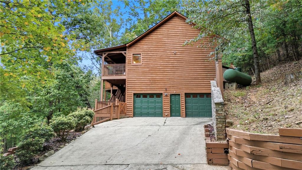 469 Moss Patch Trail Jasper, GA 30143 - Photo 39 of 49 a view of a house with a yard