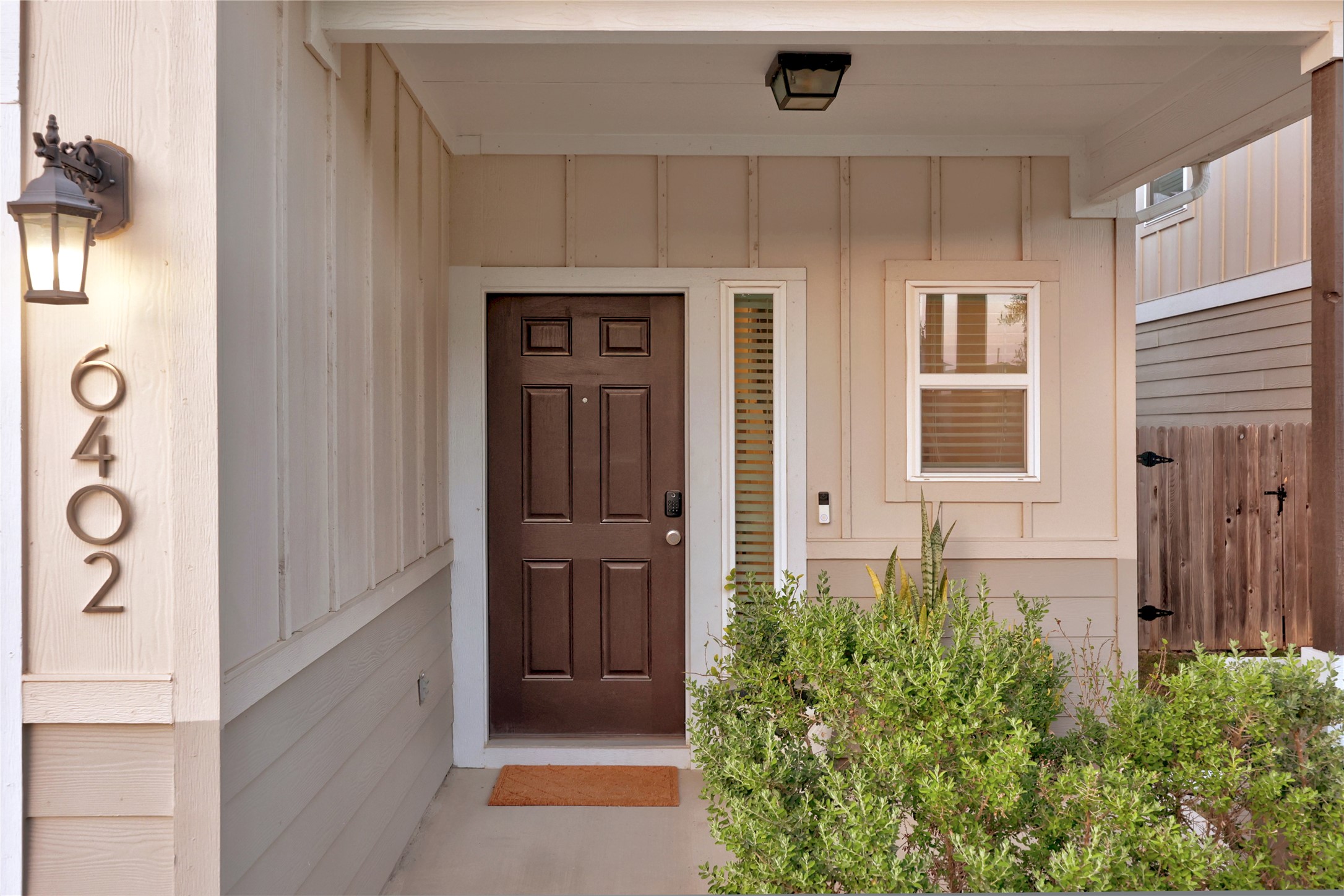 6402 Moncrieff Drive Austin, TX 78747 - Photo 4 of 37 Doorway to property with a covered porch