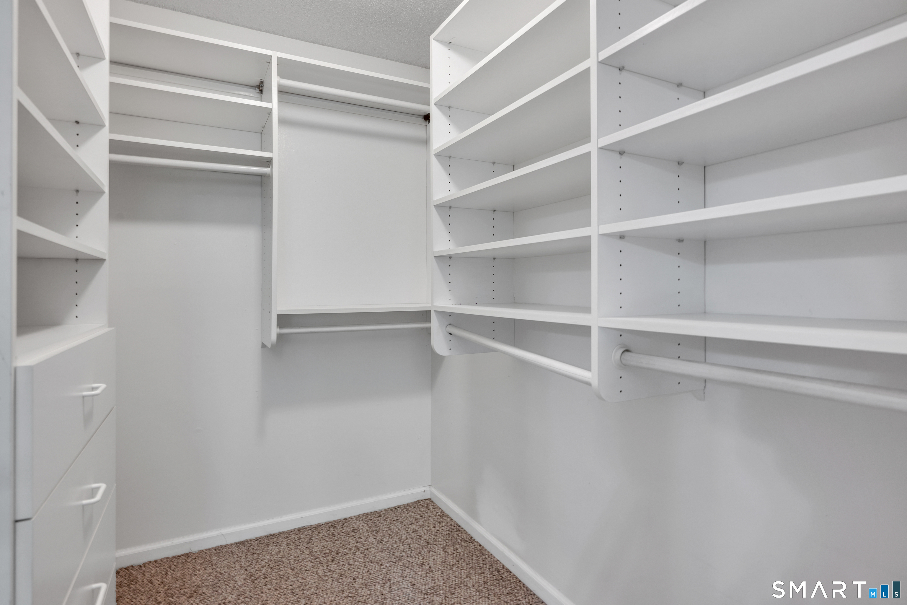 72 Timberwood Road, Unit 72 West Hartford, CT 06117 - Photo 20 of 36 Walk in closet, master bedroom