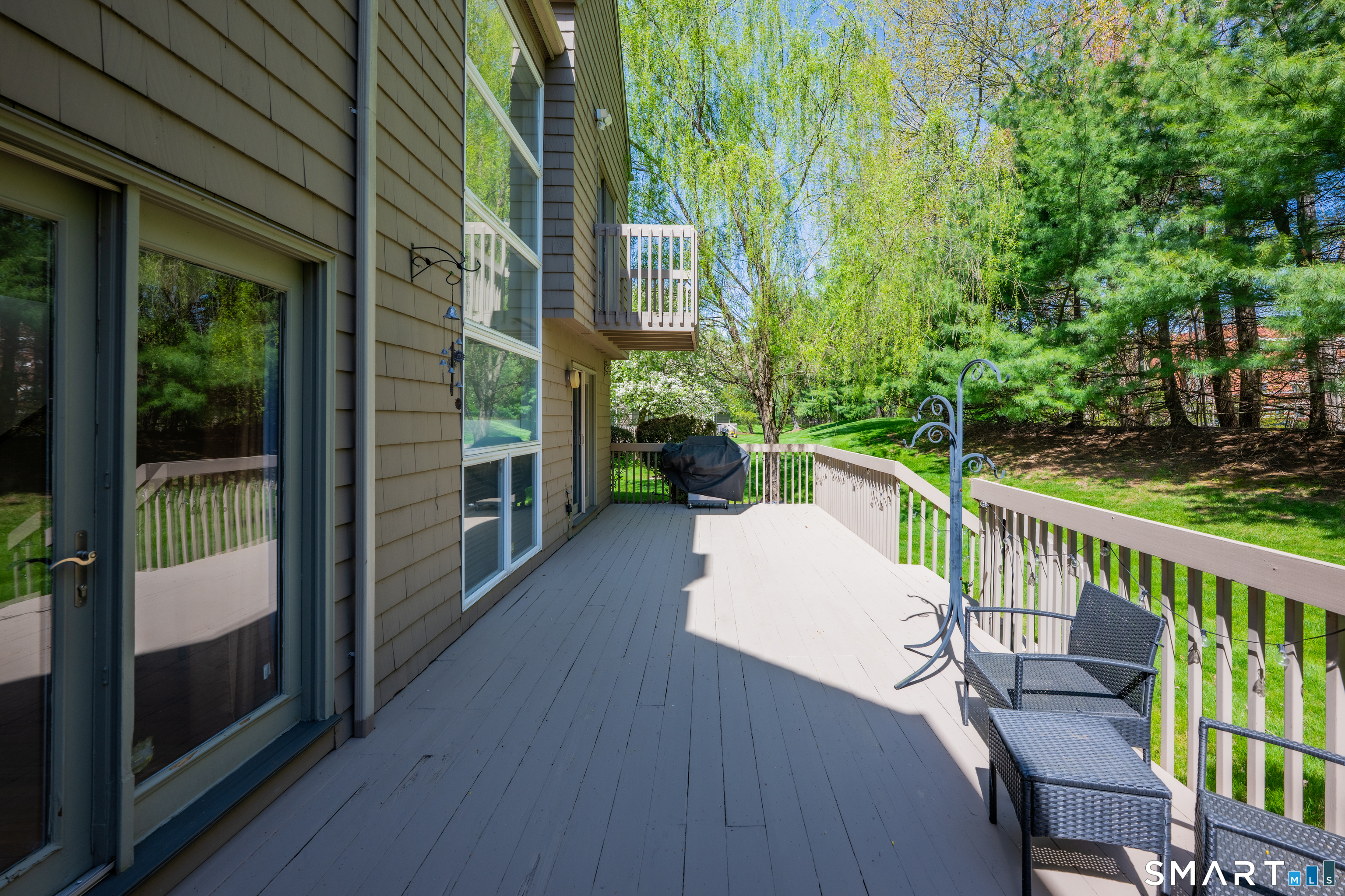 72 Timberwood Road, Unit 72 West Hartford, CT 06117 - Photo 31 of 36 Deck backyard
