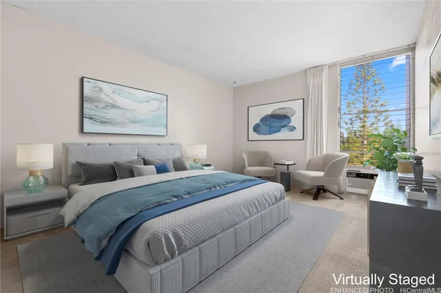 a spacious bedroom with a large bed and a couch