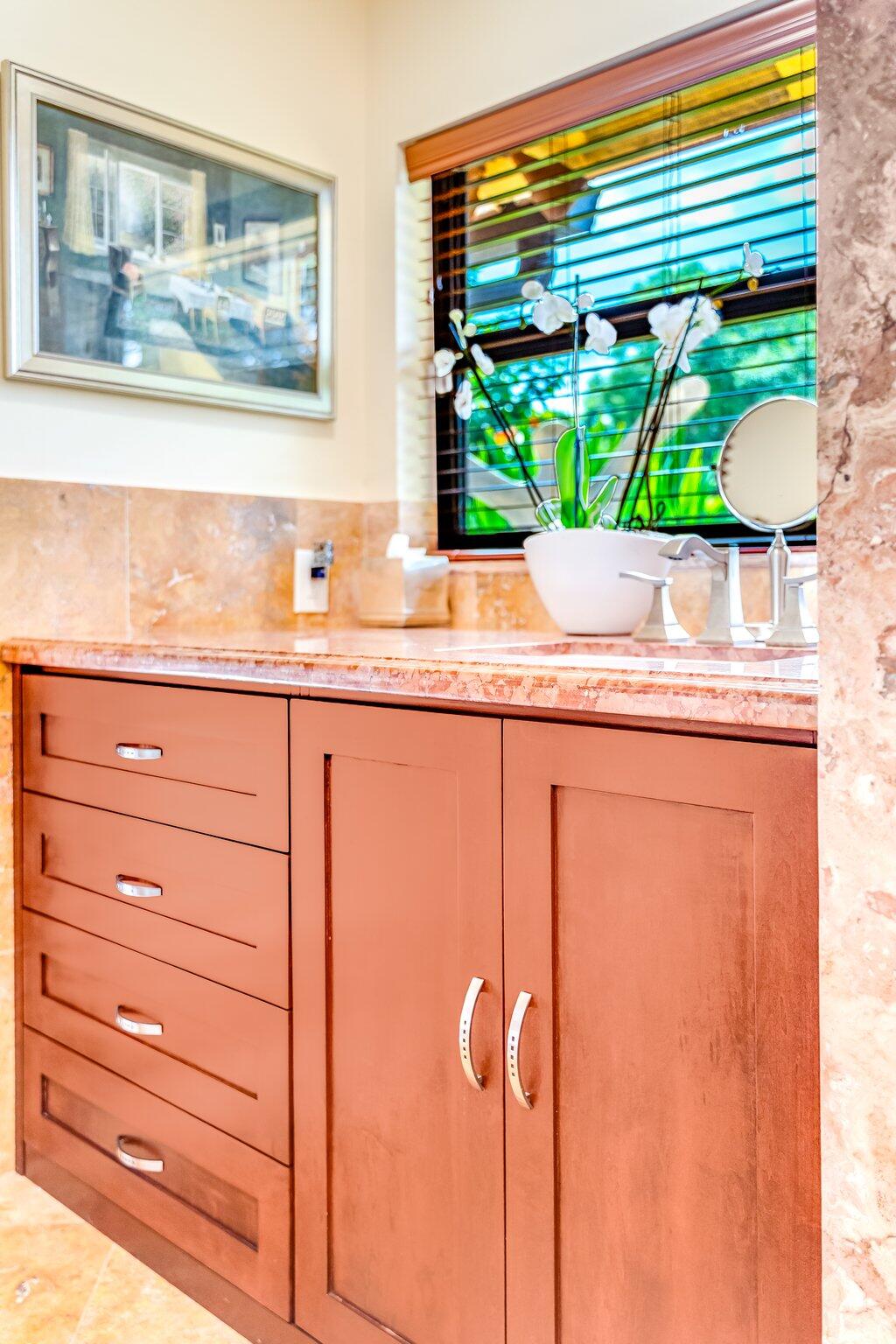 3484 Pine Haven Circle Boca Raton, FL 33431 - Photo 45 of 80 a bathroom with a granite countertop sink and a large mirror