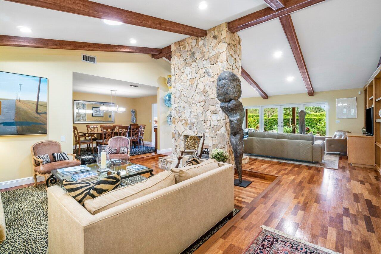 3484 Pine Haven Circle Boca Raton, FL 33431 - Photo 5 of 80 a living room with furniture and a fireplace