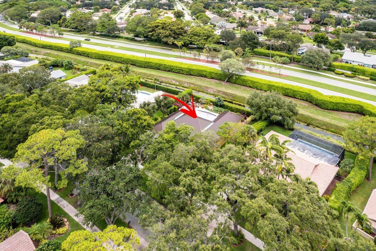 3484 Pine Haven Circle Boca Raton, FL 33431 - Photo 73 of 80 a view of a yard with swimming pool and green space
