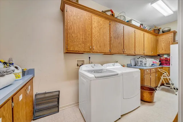 an aerial view of a house with a yard lake view and mountain view