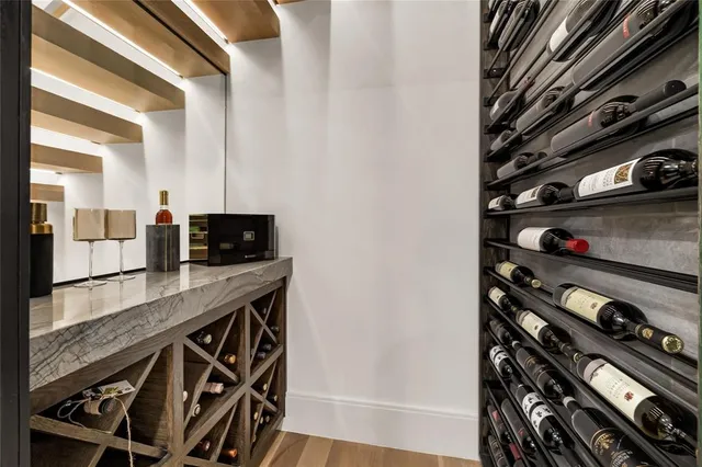a kitchen with stainless steel appliances granite countertop a stove and a microwave