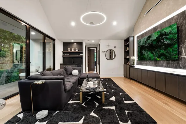 a bedroom with furniture and window