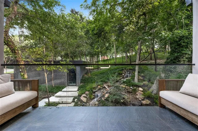 a room with gym equipment and a large window