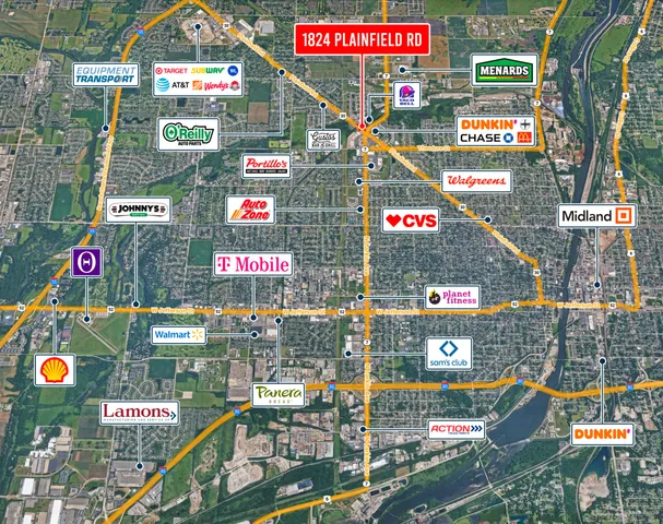 an aerial view of a house with a swimming pool