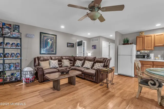 a bedroom with a bed and a television