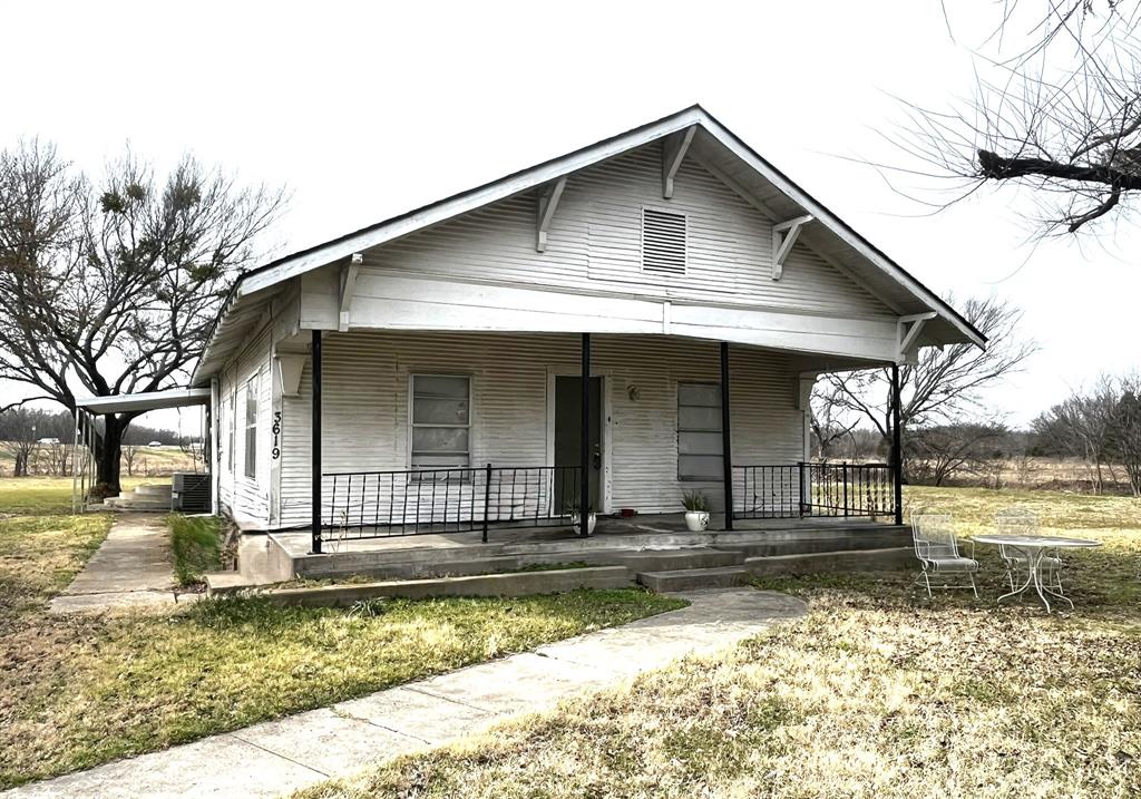 3619 FM 1183 Road Ennis, TX 75119 - Photo 1 of 12 View of front of house featuring covered porch and a front lawn