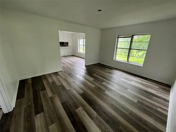 a view of an empty room and window