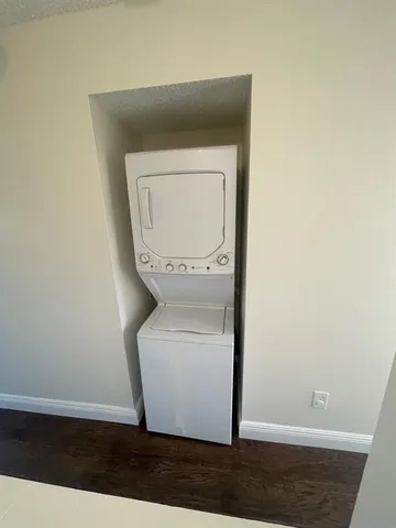 a utility room with a toilet