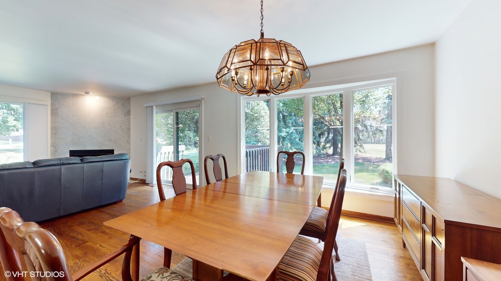 1857 Golfview Drive Bartlett, IL 60103 - Photo 17 of 26 a view of a dining room with furniture window and wooden floor