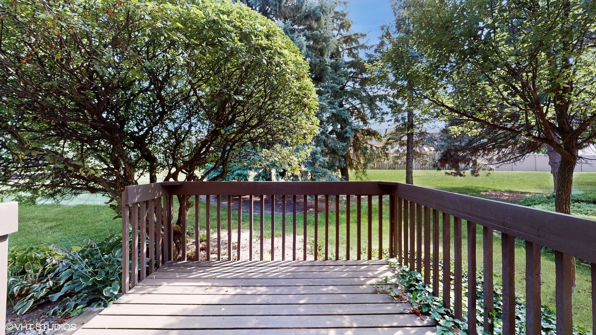 1857 Golfview Drive Bartlett, IL 60103 - Photo 20 of 26 a view of balcony with wooden floor and fence