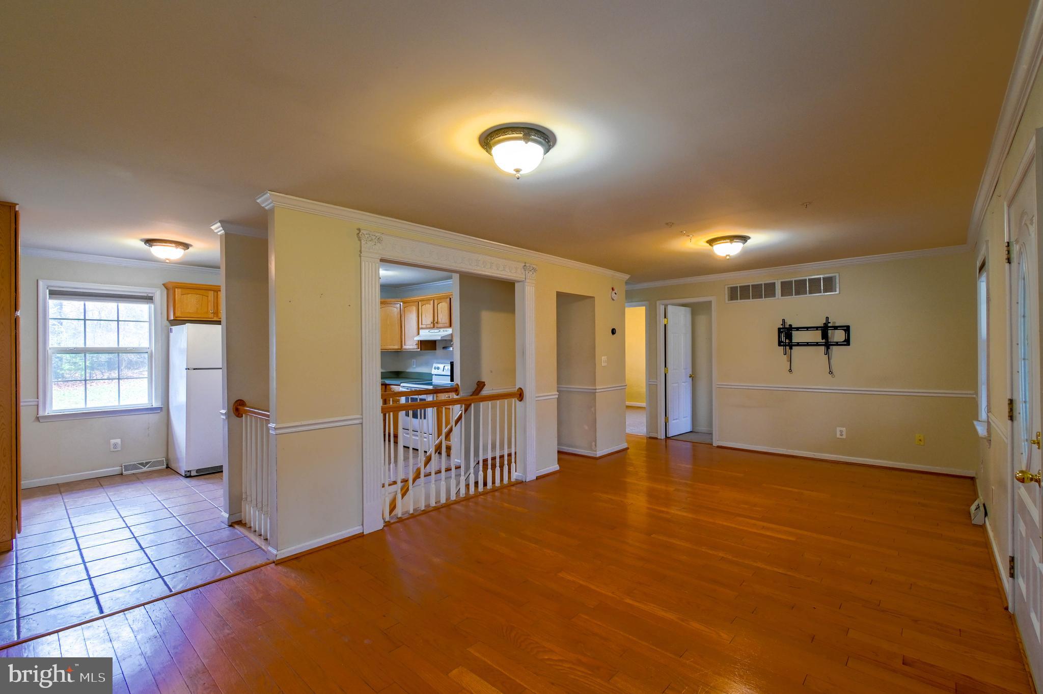 789 Queenstown Road Severn, MD 21144 - Photo 6 of 33 dining room and living room view to kitchen