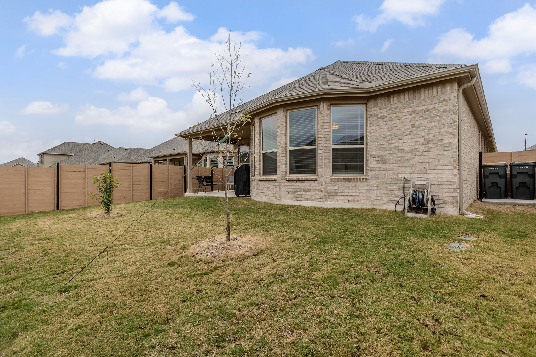 116 Raleigh Drive Georgetown, TX 78633 - Photo 26 of 28 A fenced backyard offers a private outdoor setting, perfect for relaxation and recreation.