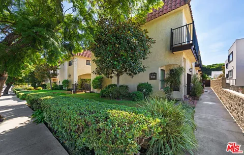 a view of a garden with pathway
