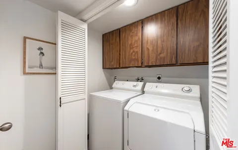 a view of storage room washer and dryer