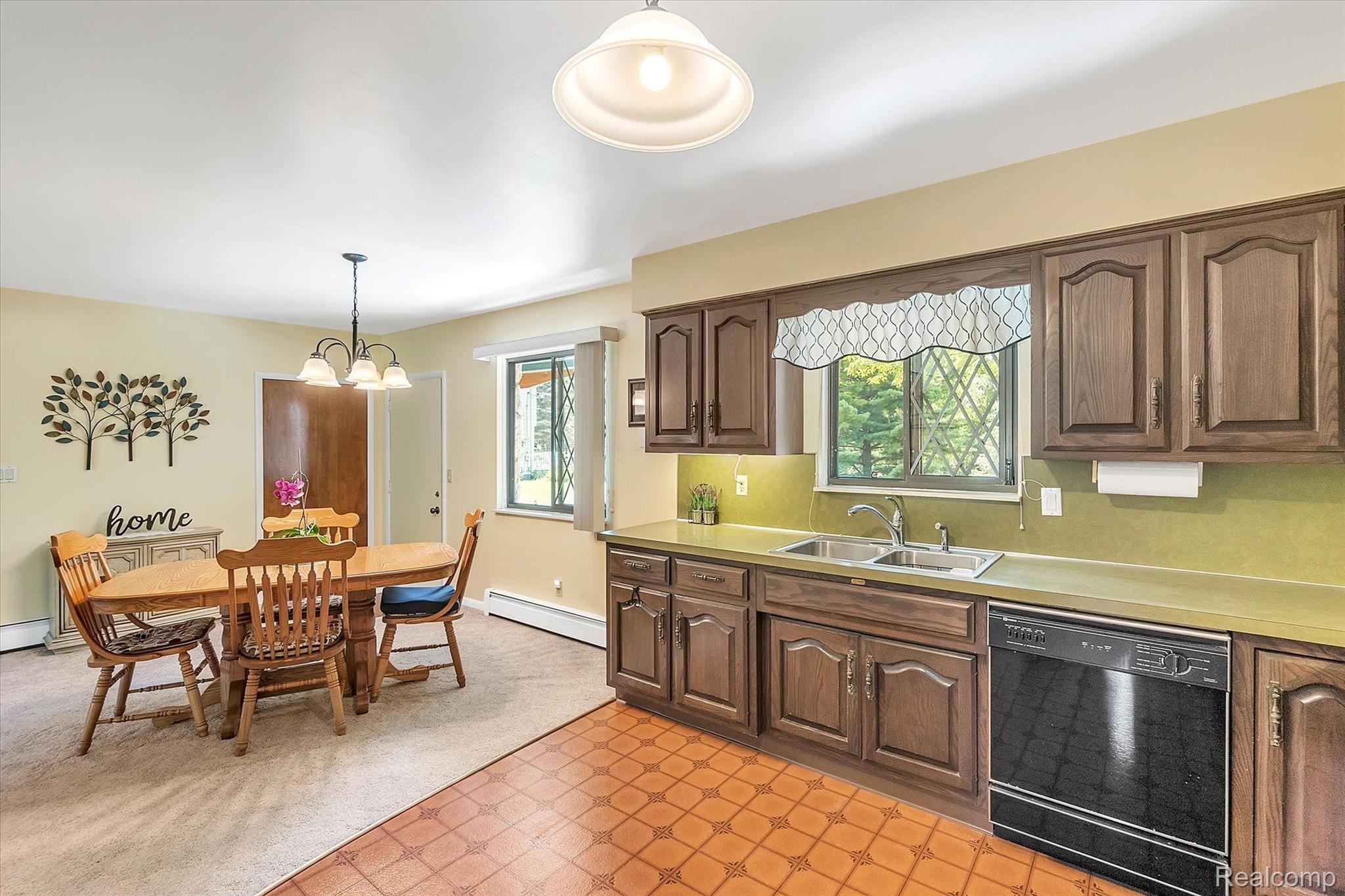 12265 Sharp Road Linden, MI 48451 - Photo 9 of 34 Kitchen opens to Dining Space with view of Park