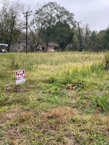 a view of a outdoor space with trees all around