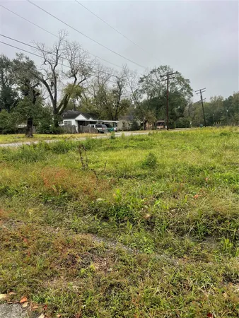 a view of backyard with outdoor space