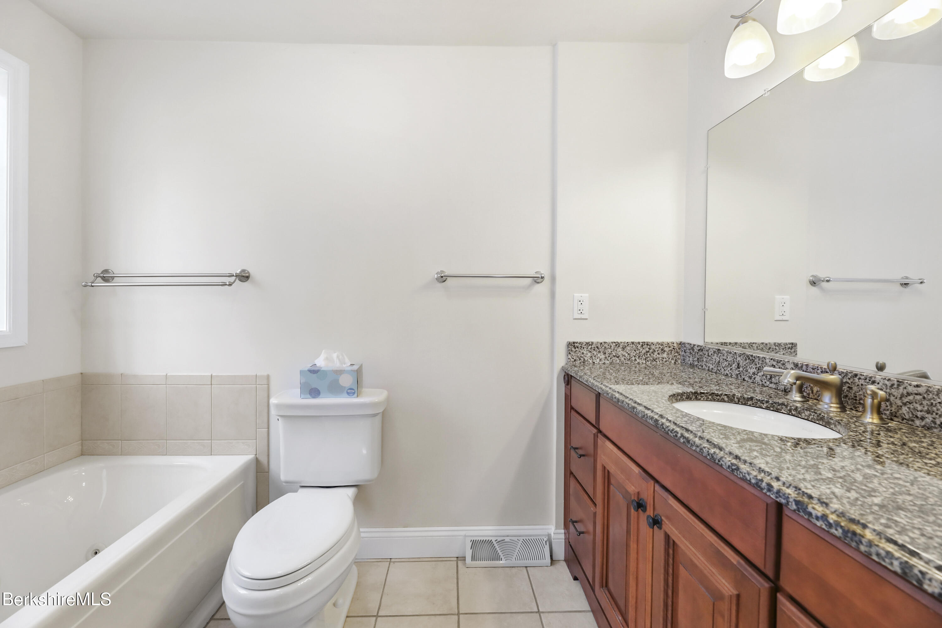 4 Swamp Road West Stockbridge, MA 01266 - Photo 20 of 35 a bathroom with a granite countertop sink a toilet and bathtub