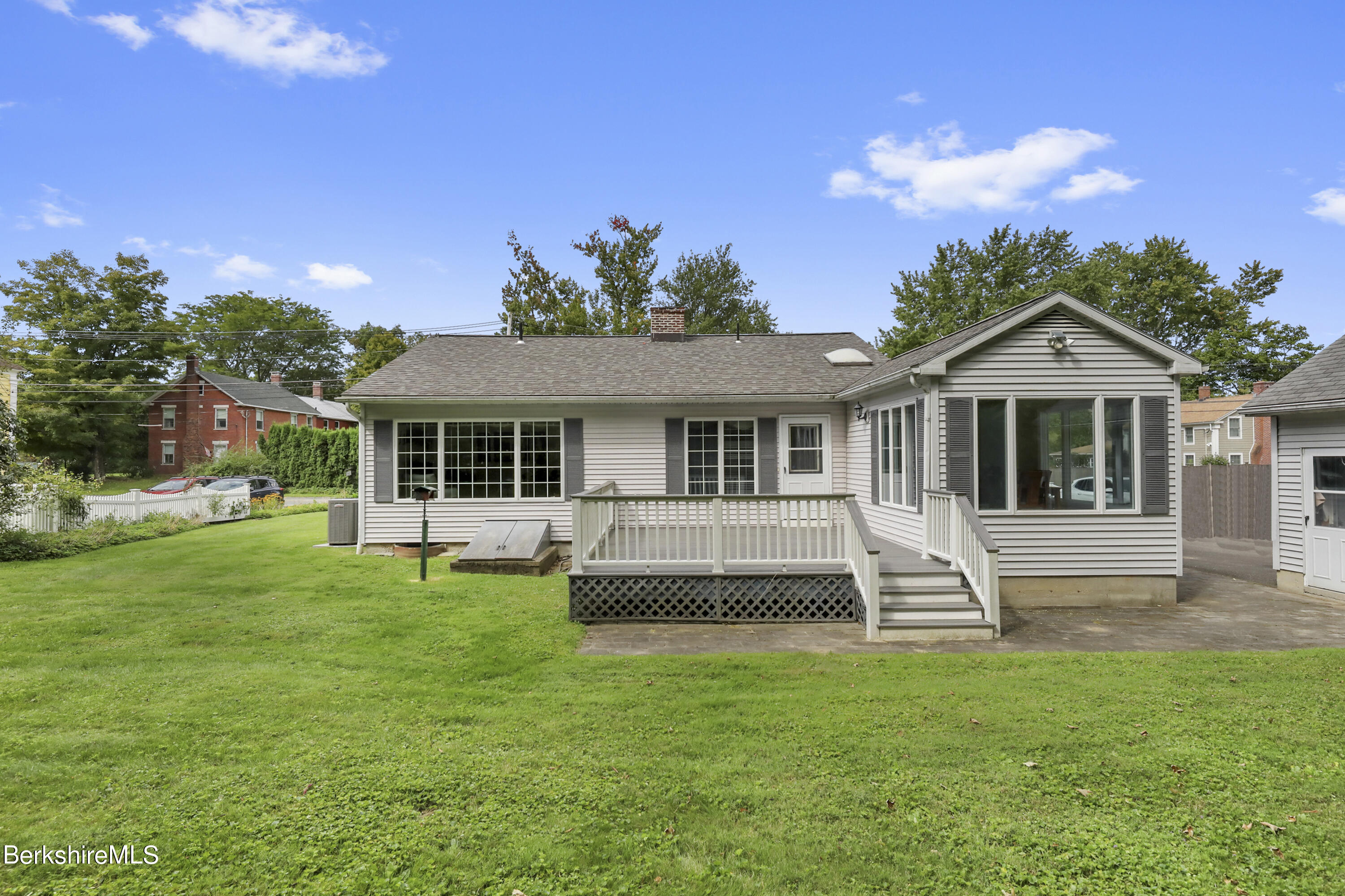 4 Swamp Road West Stockbridge, MA 01266 - Photo 24 of 35 a front view of a house with a garden