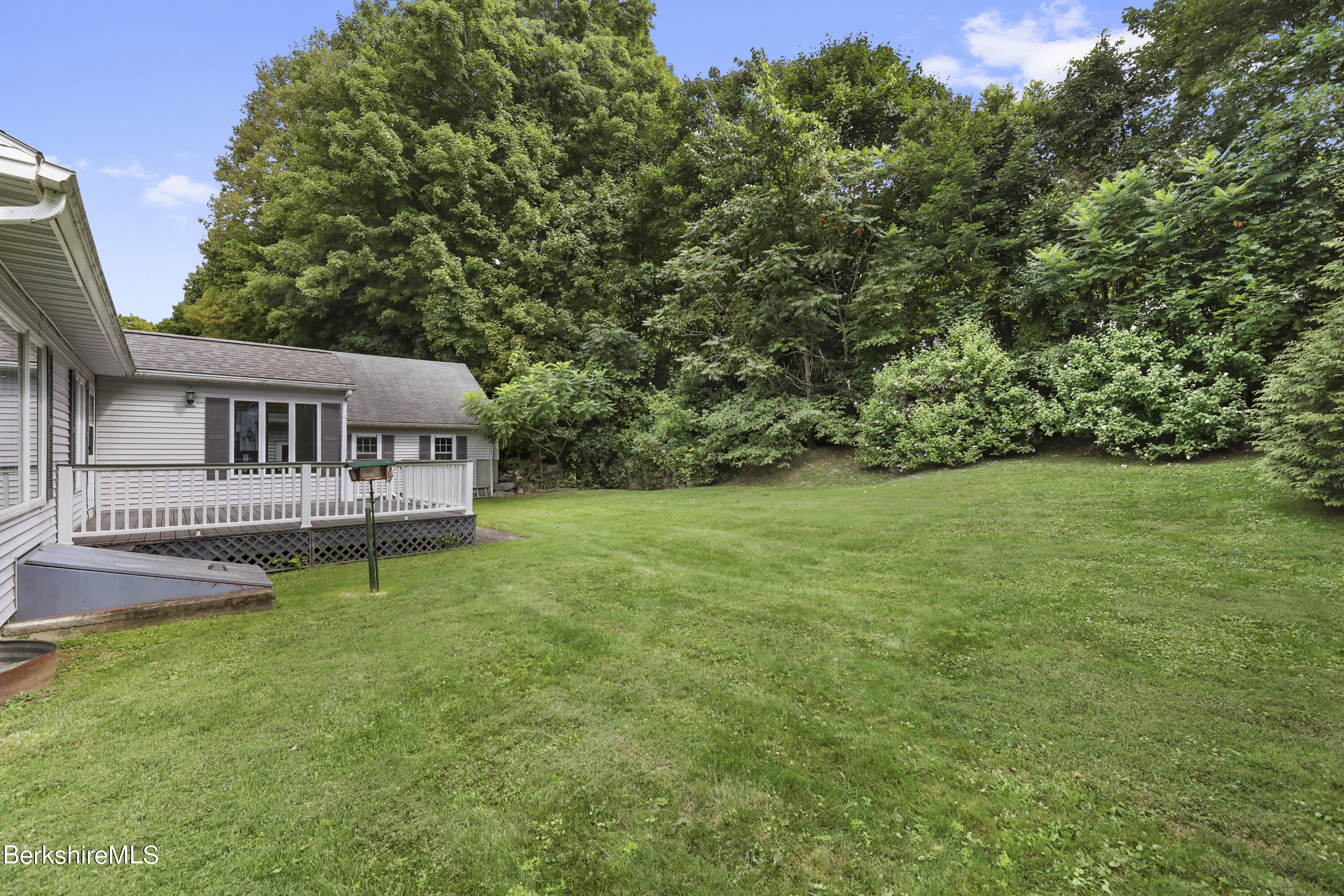 4 Swamp Road West Stockbridge, MA 01266 - Photo 28 of 35 a view of a house with a yard and a deck
