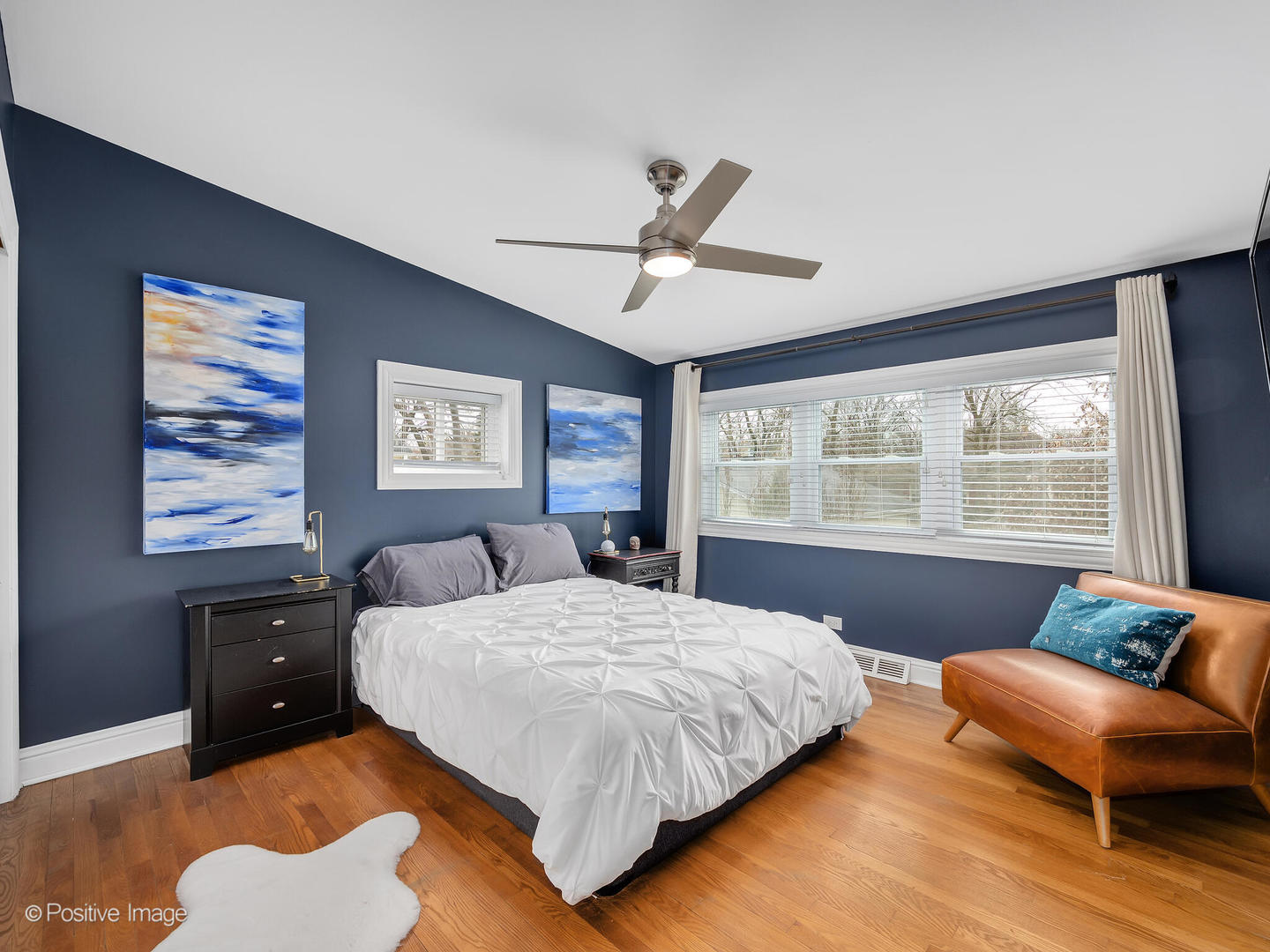 319 Maple Street Glen Ellyn, IL 60137 - Photo 11 of 26 a bedroom with a bed and wooden floor