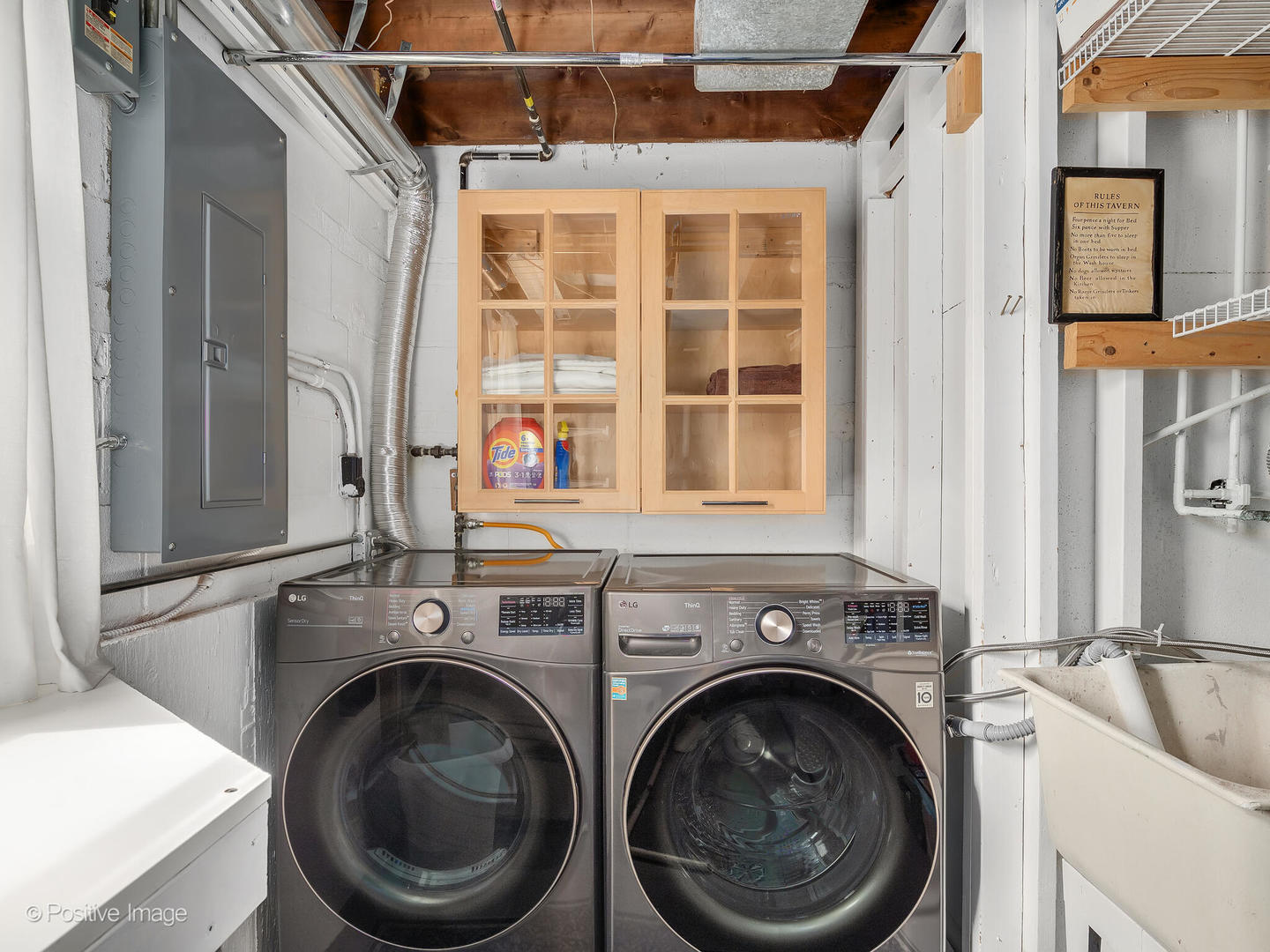 319 Maple Street Glen Ellyn, IL 60137 - Photo 18 of 26 a view of a bathroom with washing machine and washing machine