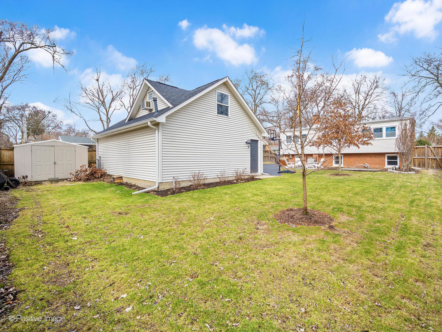 319 Maple Street Glen Ellyn, IL 60137 - Photo 22 of 26 a backyard of a house with table and chairs