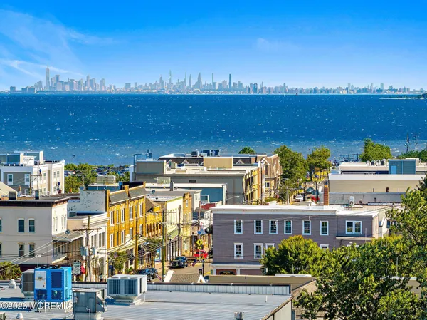 a view of a city with tall buildings
