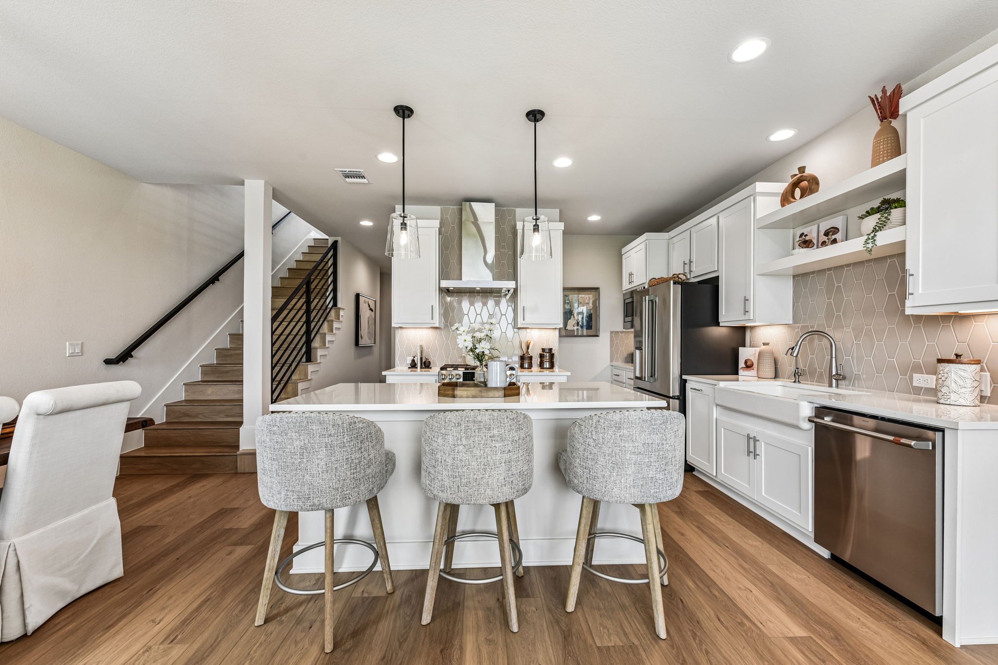 9033 Cattle Baron Path Austin, TX 78747 - Photo 12 of 40 Culinary aspirations meet contemporary design in this bright kitchen, perfect for entertaining guests.