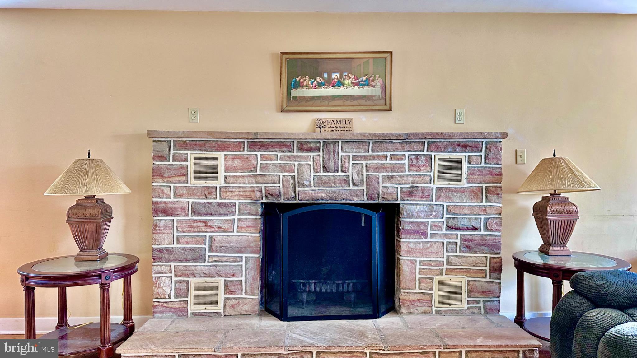 98 Maple Street Macungie, PA 18062 - Photo 14 of 56 a living room with furniture and a fireplace