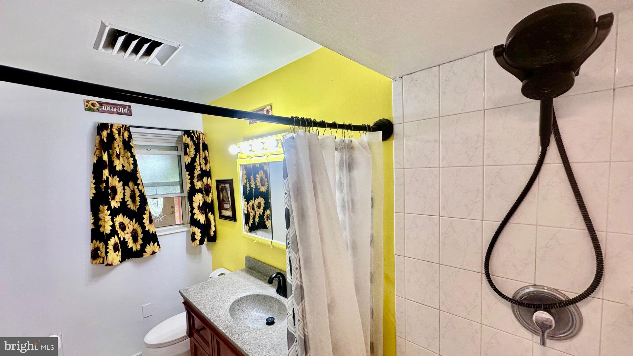 98 Maple Street Macungie, PA 18062 - Photo 26 of 56 a bathroom with a sink toilet and shower