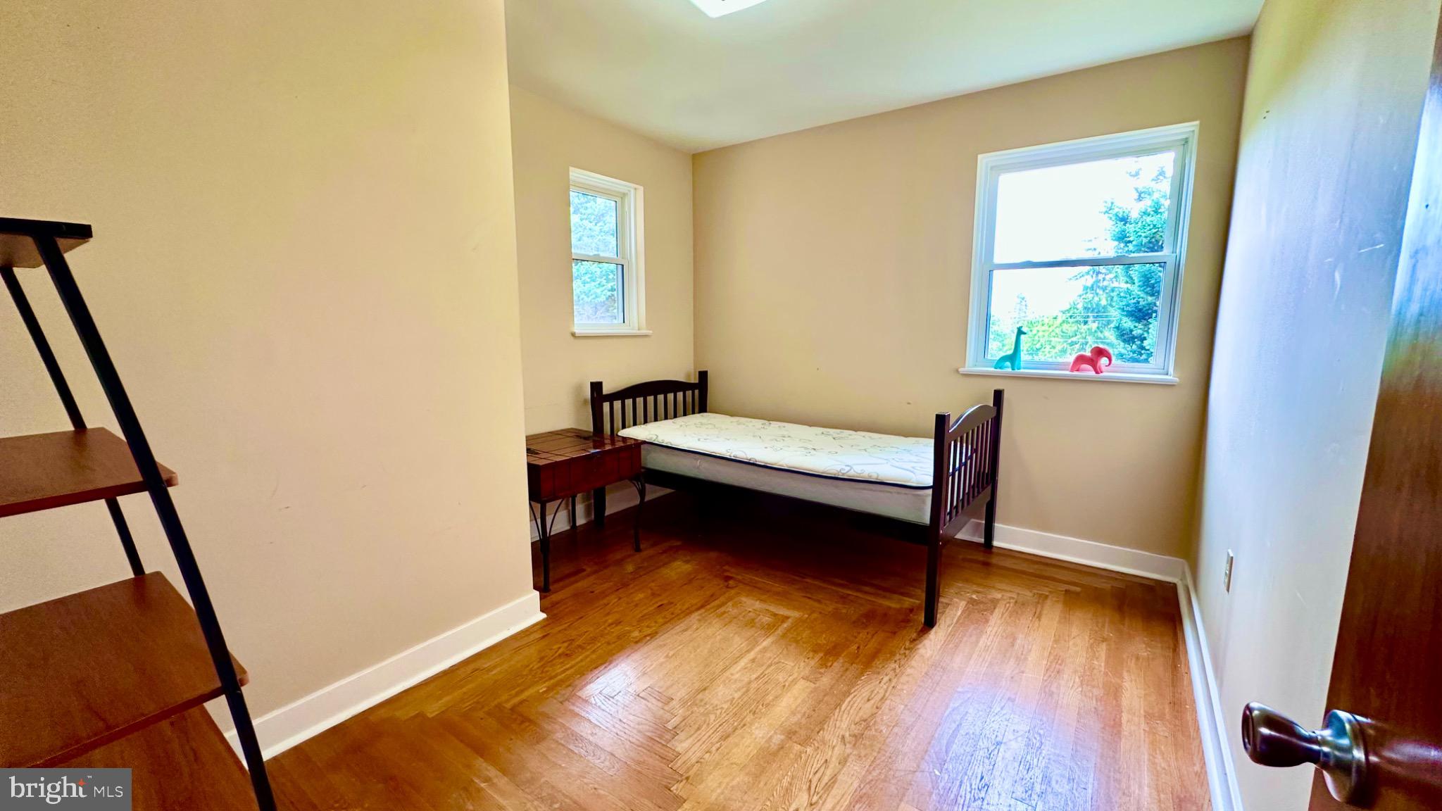 98 Maple Street Macungie, PA 18062 - Photo 27 of 56 a bedroom with a bed and a window