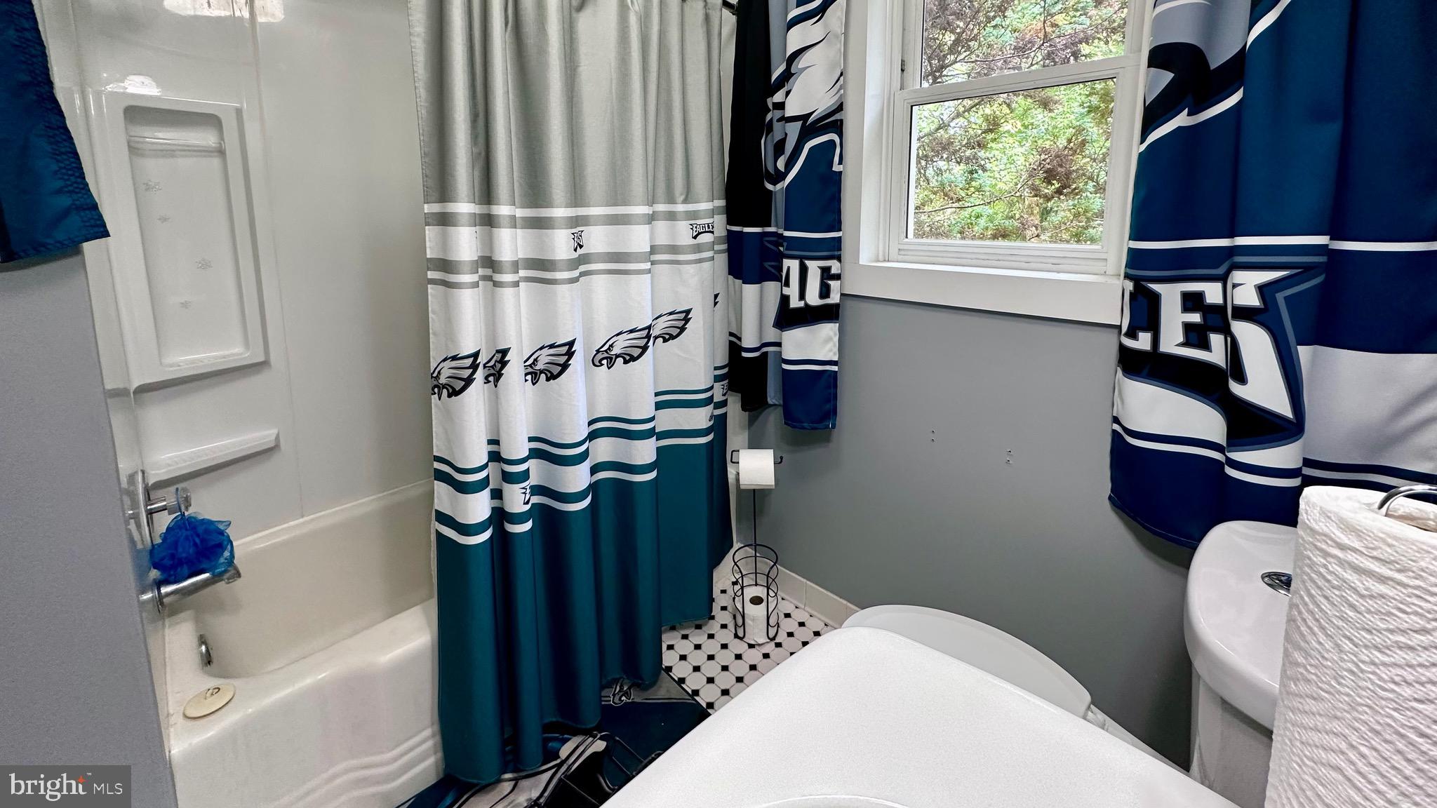 98 Maple Street Macungie, PA 18062 - Photo 34 of 56 a bathroom with a bathtub a sink and a shower