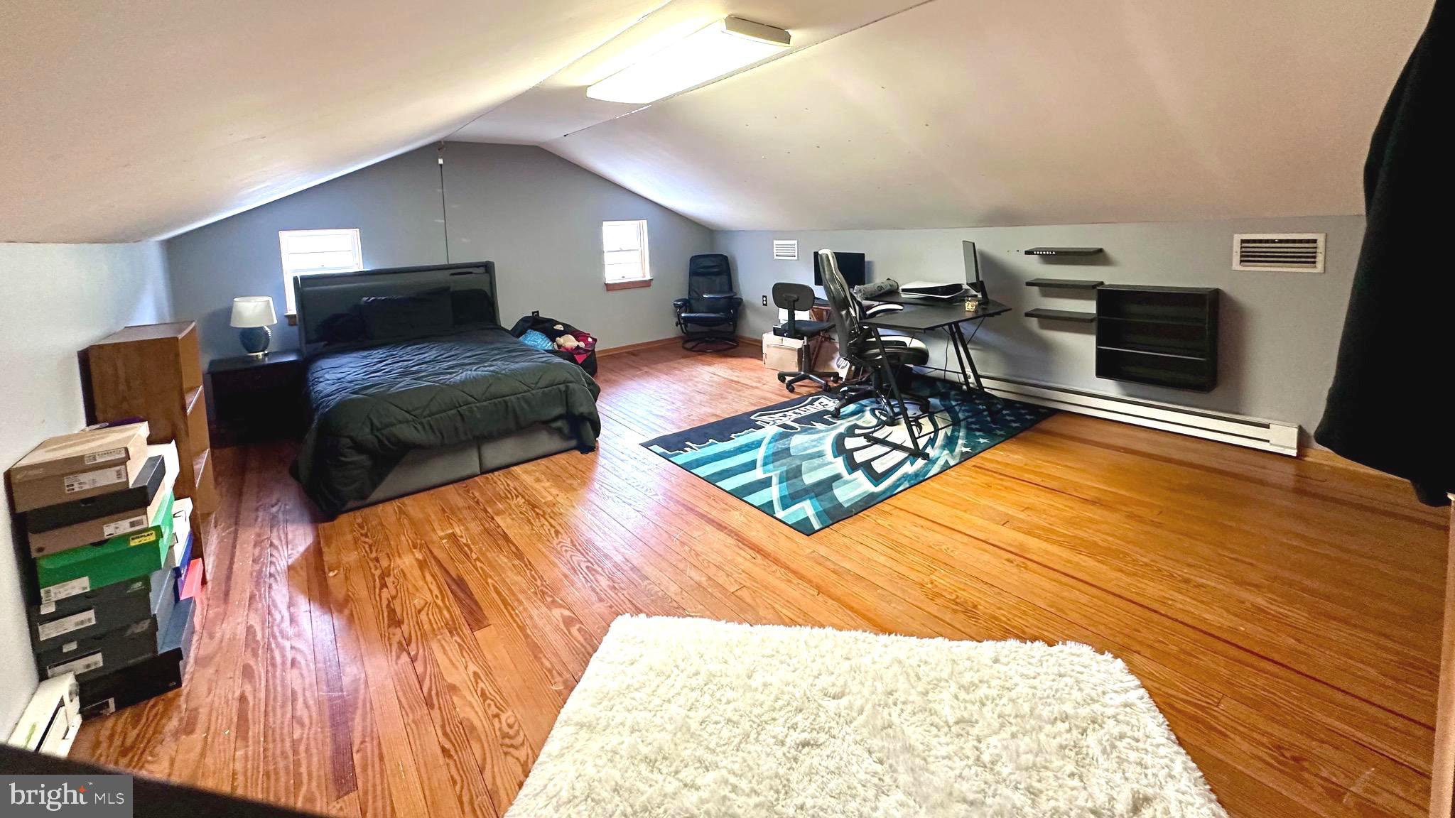 98 Maple Street Macungie, PA 18062 - Photo 35 of 56 a living room with furniture and a wooden floor
