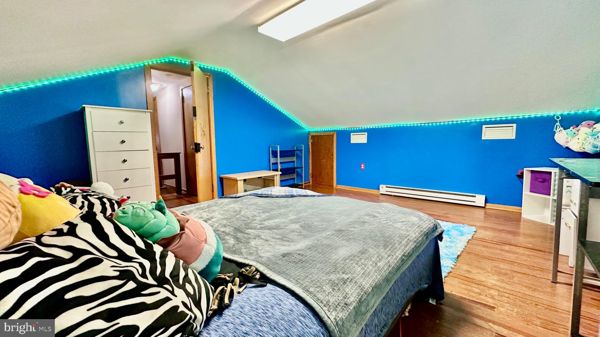 98 Maple Street Macungie, PA 18062 - Photo 41 of 56 a bedroom with a bed and a dresser