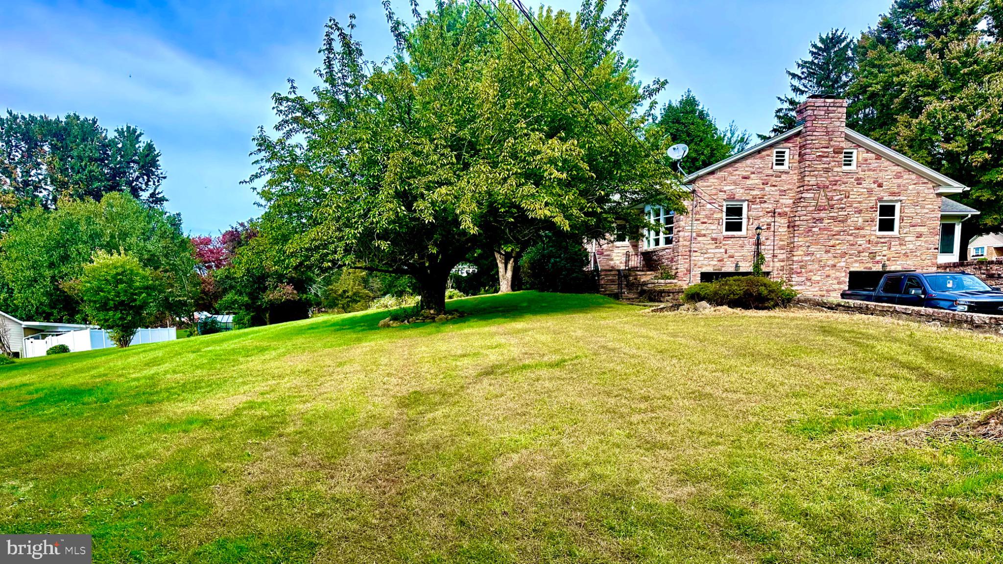 98 Maple Street Macungie, PA 18062 - Photo 52 of 56 a view of a house with a yard