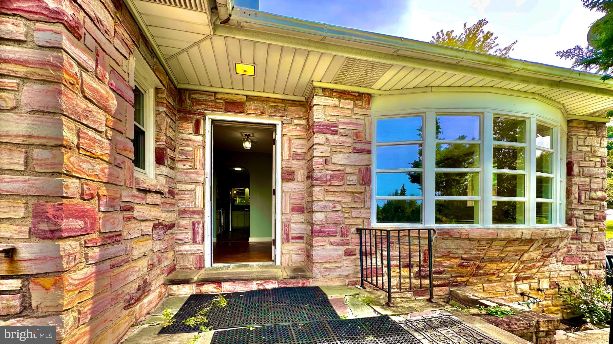 98 Maple Street Macungie, PA 18062 - Photo 53 of 56 a view of brick building with a door