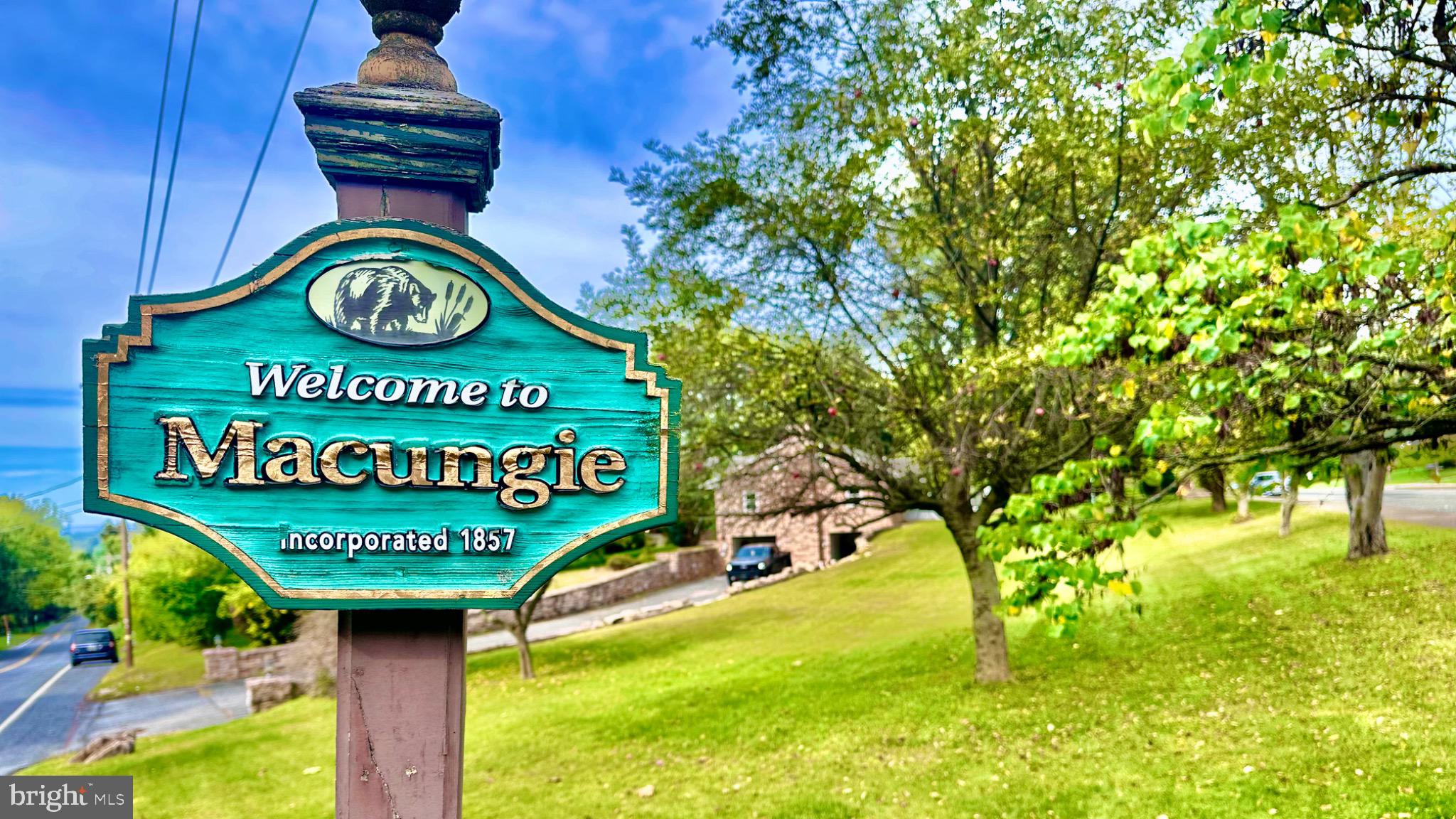 98 Maple Street Macungie, PA 18062 - Photo 54 of 56 a sign that is on a pole