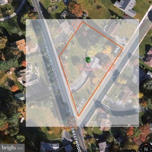 98 Maple Street Macungie, PA 18062 - Photo 55 of 56 an aerial view of a residential apartment building with a yard