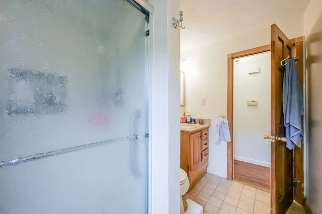 a view of a bathroom from the hallway