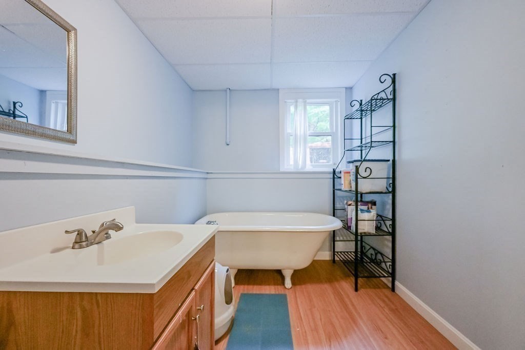 9 Lawrence Road Plymouth, MA 02360 - Photo 17 of 30 a dining room with a table and chairs