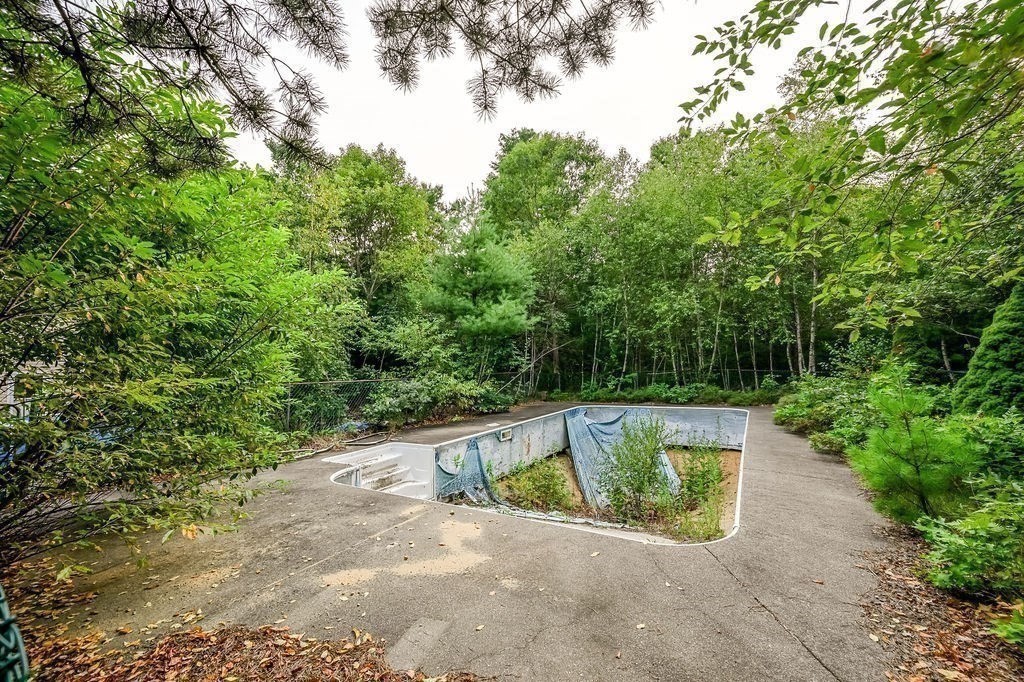 9 Lawrence Road Plymouth, MA 02360 - Photo 25 of 30 a view of a swimming pool with a yard