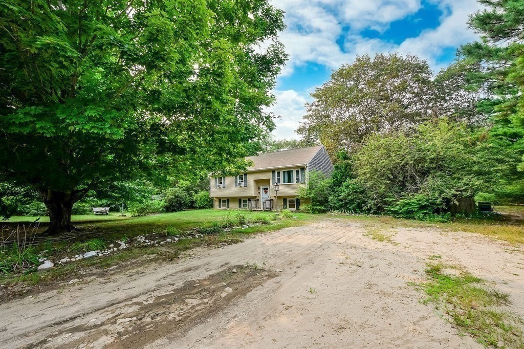 9 Lawrence Road Plymouth, MA 02360 - Photo 26 of 30 a view of a house with a yard and large trees