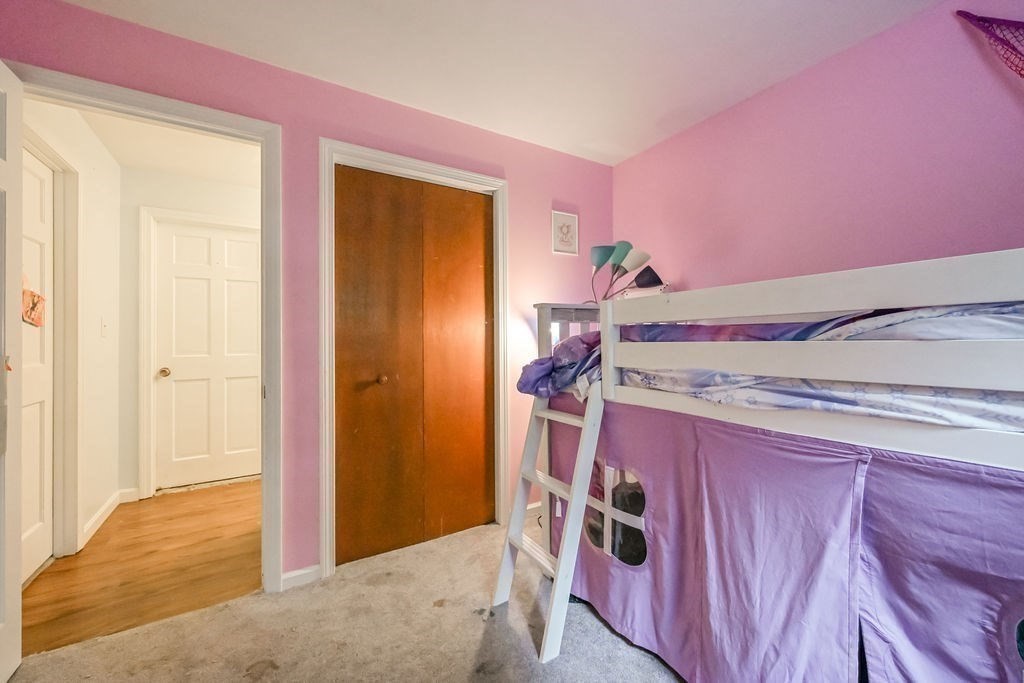 9 Lawrence Road Plymouth, MA 02360 - Photo 9 of 30 a bedroom with a bed and a window